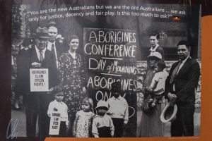 Die ersten Einwohner Australiens kämpfen um ihre Rechte und Forderungen (Plakat aus dem Botanischen Garten in Sydney)